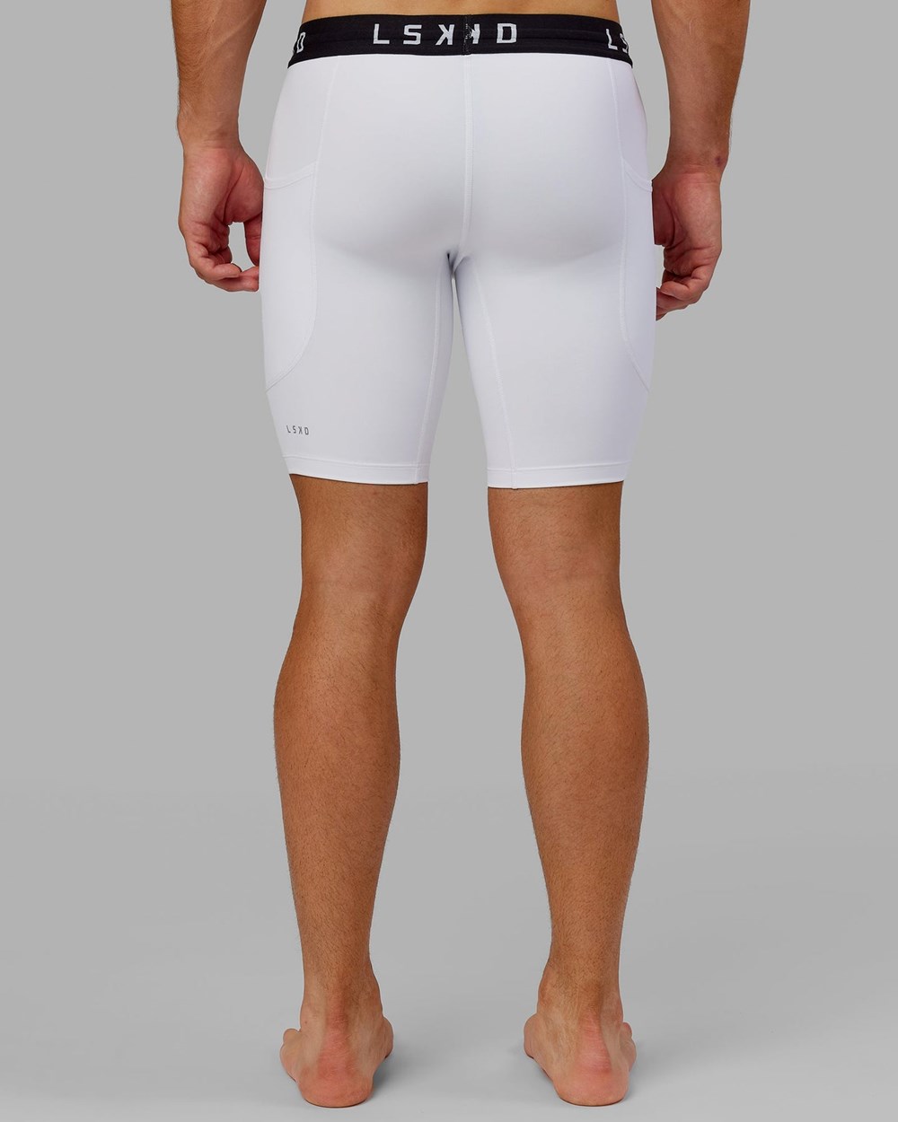 White LSKD Perform Short Tight | EG2841763